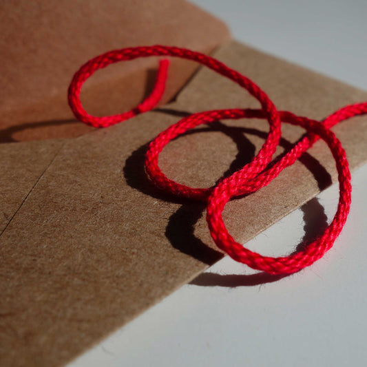 Red thread for desire and protection